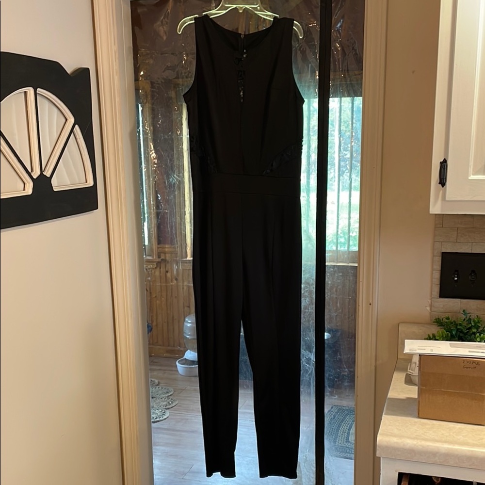 Classic Fashion Collection, Sleek Black Sleeveless Jumpsuit with Straight Leg